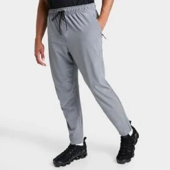 Men's Nike Dri-FIT Unlimited Tapered Leg Versatile Training Pants Smoke Grey/Black/Smoke Grey - FB7548 084